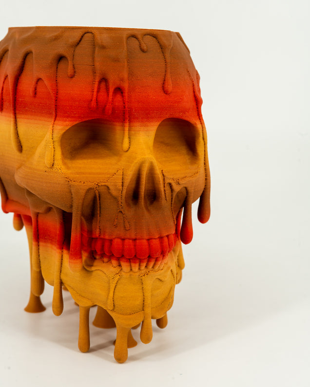 Close up of Melting Skull Planter in Red Cedar - Miyagi's Garden